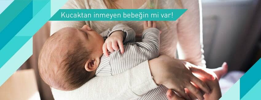 Kucaktan inmeyen bebeğin mi var!